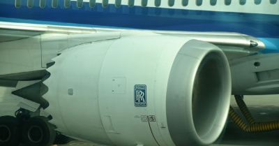 a aeroplane engine turbine with rolls royce branding